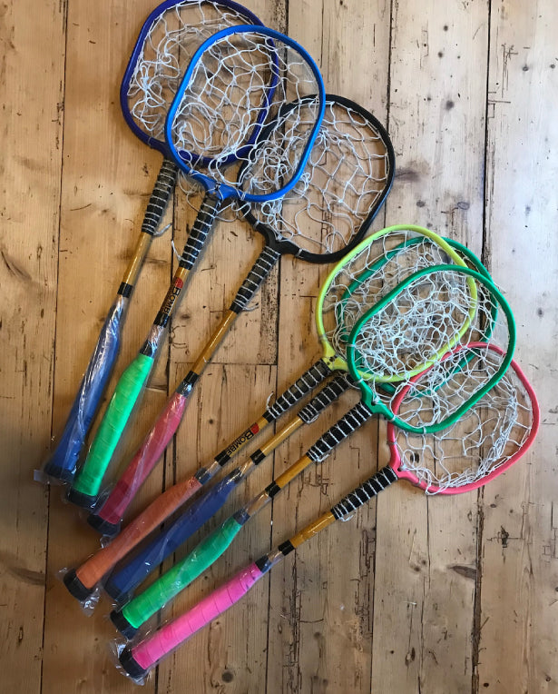 Bombers kids polocrosse racquets in purple, blue, black, yellow, pink and red