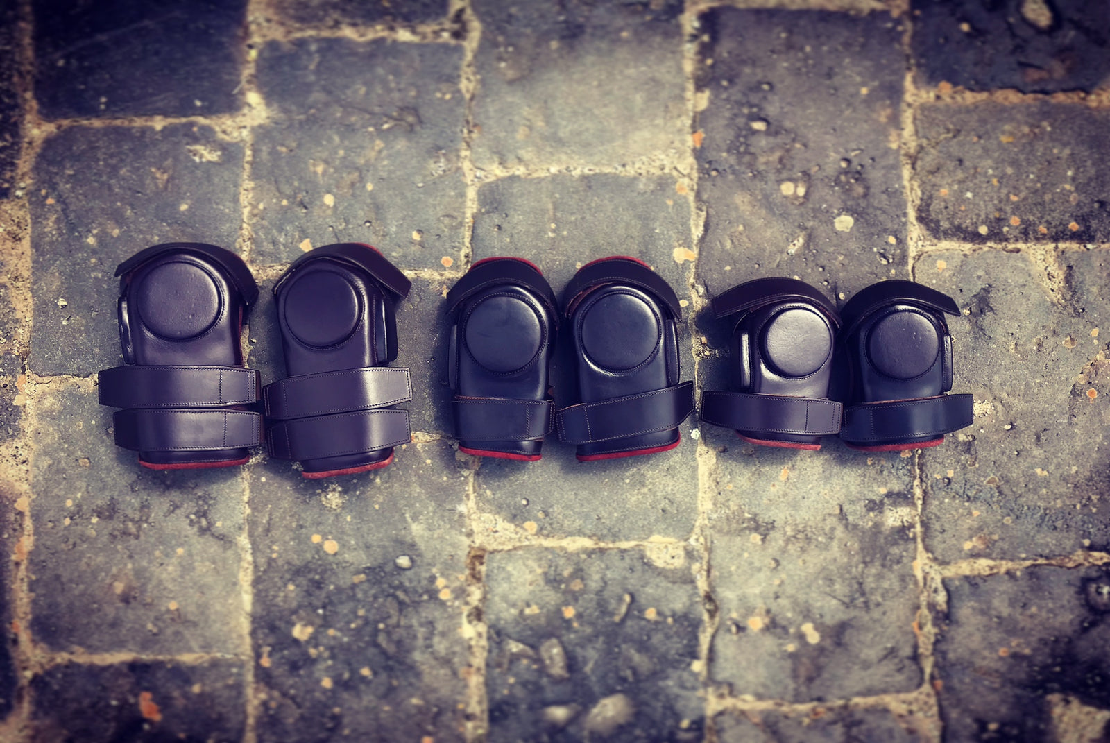 Bombers makes polo knee pads for adults and in kids sizes. 