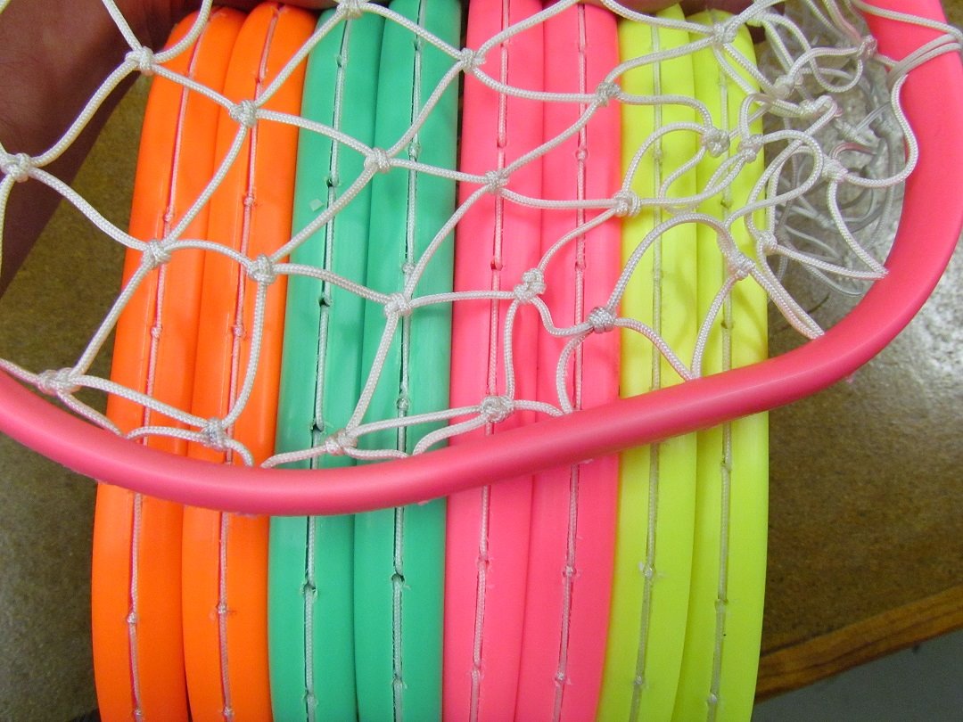 Bombers kids polocrosse racquets in purple, blue, black, yellow, pink and red